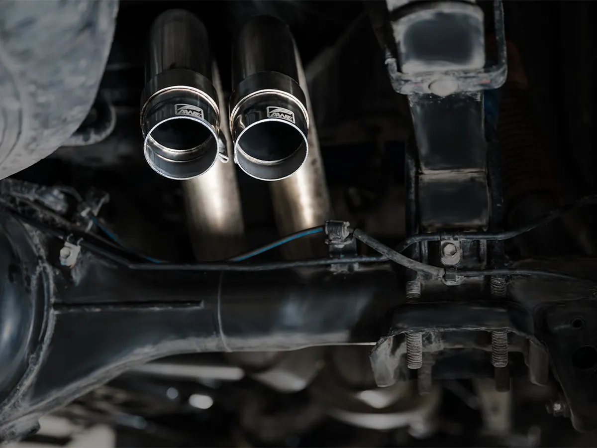 AWE 0FG Exhaust with BashGuard for 3rd Gen Tacoma - Dual Diamond Black Tips product image