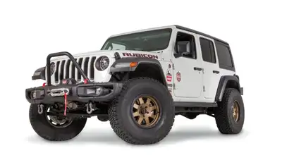 Warn WARN - This "stinger" bolts to the factory steel bumper on a Jeep Wrangler JL or Gladiator JT. The 2-in diameter tube provides a rugged style and extra front