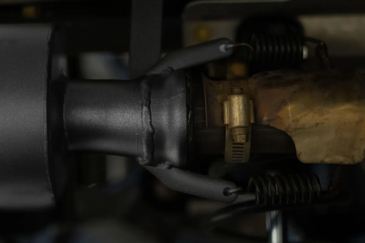 ATV Exhaust System With Sport Muffler; Slip-On Combination; 1.75 in. Inlet; 4.25 in. Diameter Body; Chambered Muffler; product image