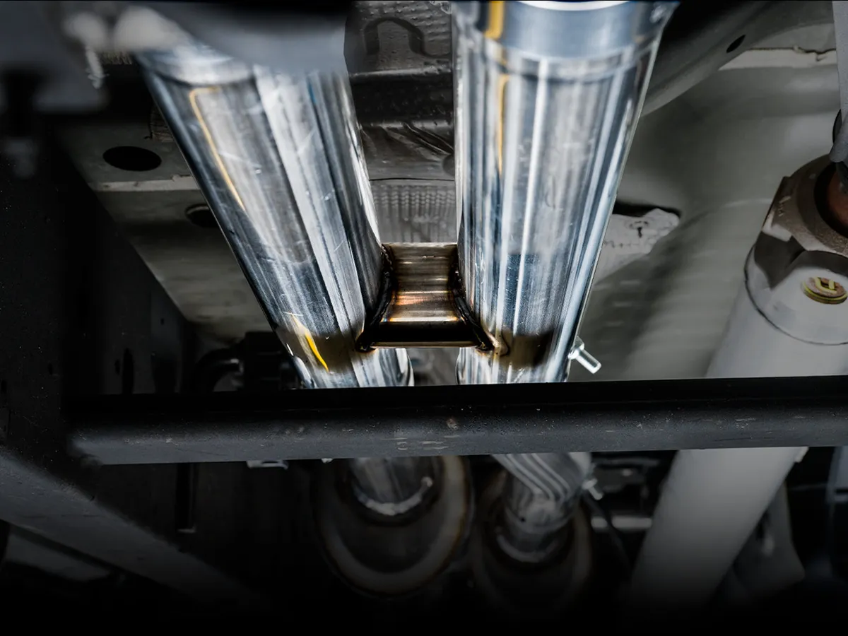 AWE 0FG Catback Split Rear Exit Exhaust for 4th Gen Silverado/Sierra 1500 6.2L (with bumper cutouts) - Quad Chrome Silver Tips product image