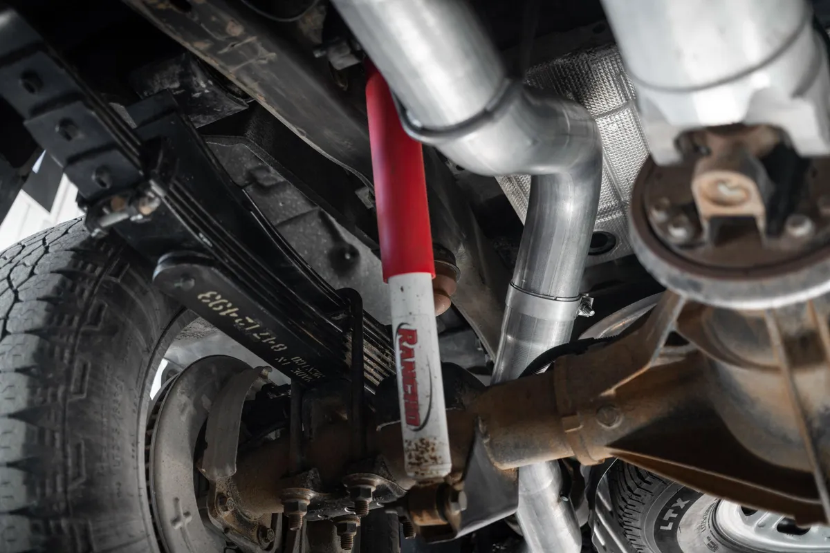 20-Up Silverado/Sierra 2500/3500 Armor BLK Black Coated Aluminized Steel 4 Inch Filter Back Single Side Exit Exhaust System MBRP product image