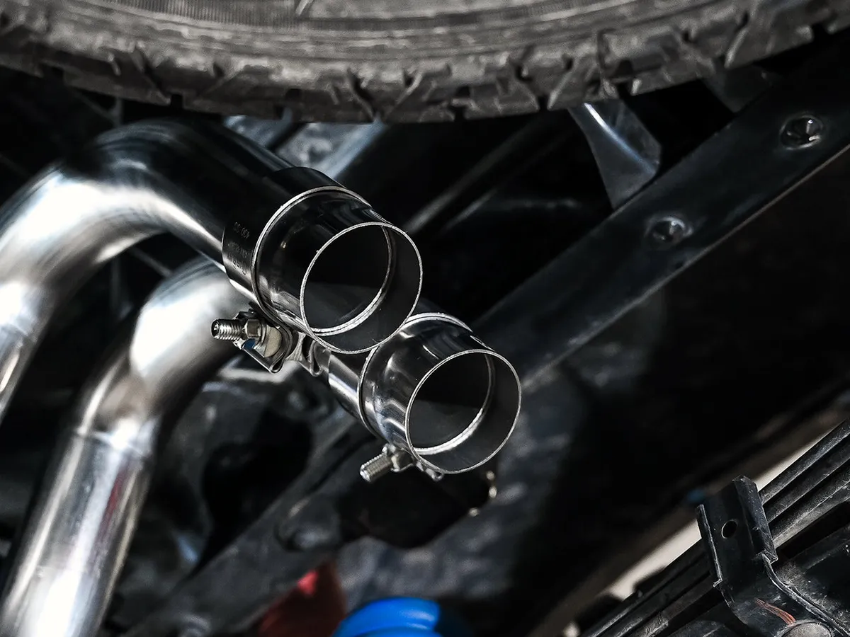 AWE 0FG Exhaust with BashGuard for 3rd Gen Tacoma - Dual Diamond Black Tips product image