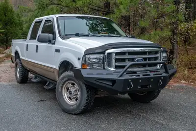 Fab Fours 9904 F250/F350/F450/F550/0004 Excursion Red Steel Front w/ Prerunner Guard Bumper