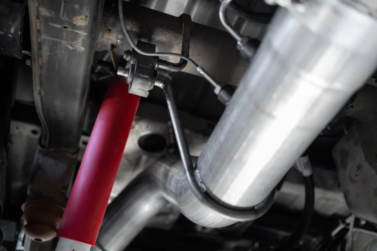 20-Up Silverado/Sierra 2500/3500 Armor BLK Black Coated Aluminized Steel 4 Inch Filter Back Single Side Exit Exhaust System MBRP product image