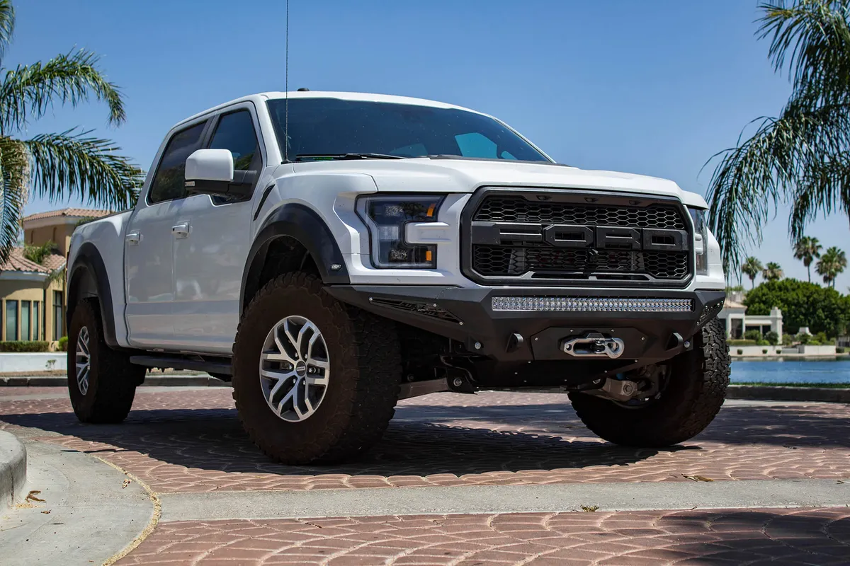 Ford Raptor 2017 - up Stealth Fighter Front Bumper with Winch Mount with 10 dually mountsuniversal plate on top and 10 SR mounts on outer with D-ring Clevis Mounts in Hammer Black with Satin Black panels product image