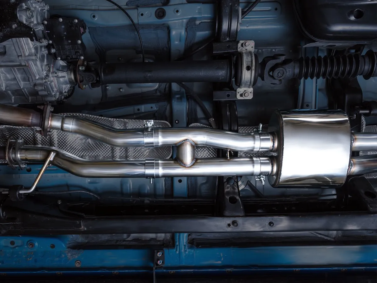 AWE 0FG Exhaust with BashGuard for 3rd Gen Tacoma - Dual Diamond Black Tips product image