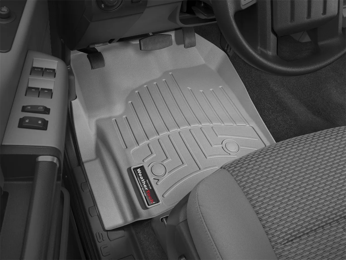 2012 + Ford F-250/F-350/F-350/F-550 Front FloorLiner Fits models with footrest in forward left corner fo the driver side floor space only: does not fit models with manual 4x4 shifter; SuperCrew and SuperCab Grey product image