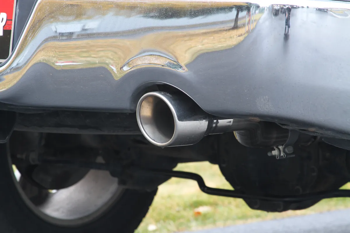 09-13 Dodge Ram 1500 5.7L Hemi Magnum 2/4 Wheel Drive All Wheelbases 2.50in Outlets 50 Series H.D. Muffler 4.00in Logo Embossed Stainless Tips American Thunder; Incl Tube Extensions For Dual Rear Exit In Kit Mandrel Bent Tubing 16 Gauge 409S Stai product image