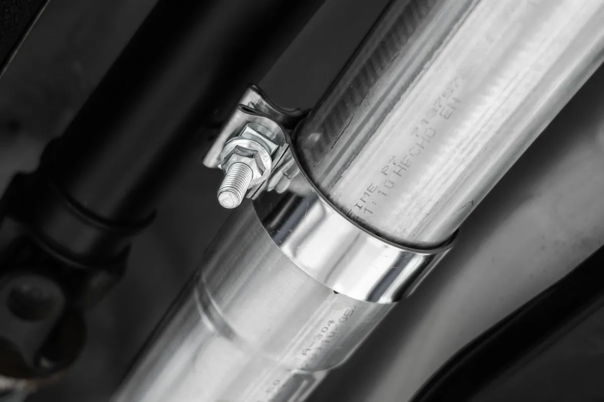 Armor Pro Cat Back Exhaust System; 3 in.; Race Profile; Dual Split Rear; 4 in. Dual Out Carbon Fiber Quad Tips; 304 Stainless Steel; product image