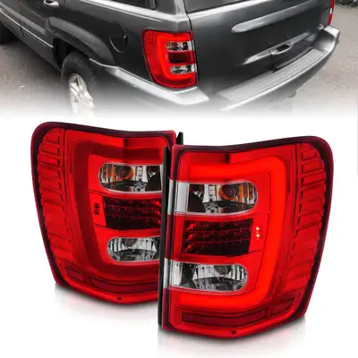 ANZO USA LED Tail Lights w Light Bar Chrome Housing Red Clear Lens Jeep Grand Cherokee 1999-2004