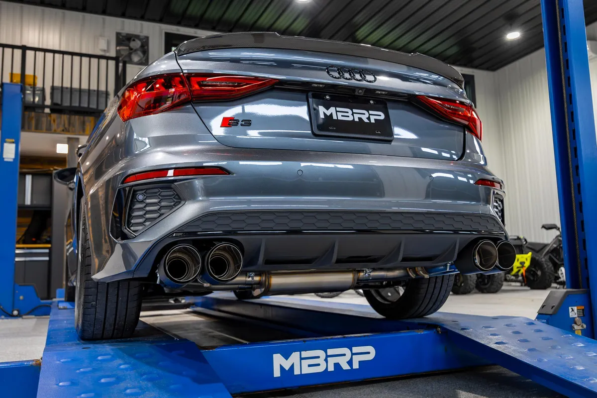 Armor Pro Cat Back Exhaust System; 3 in.; Quad Split Rear Exit; 4.5 in. Carbon Fiber Tips; w/Active Exhaust; T304 Stainless Steel; product image