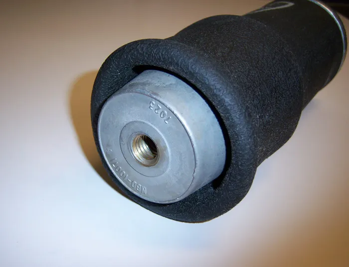 Firestone 7012 Rolling Sleeve Air Spring 5 Inch Diameter W/ 1/8 Inch NPT Port Length Is 4 Inch Minimum 7 -8 Inch Ride Height And 13 Inch Maximum Load Capacity Is 1000 LbsAt 100 Psi Ridetech product image