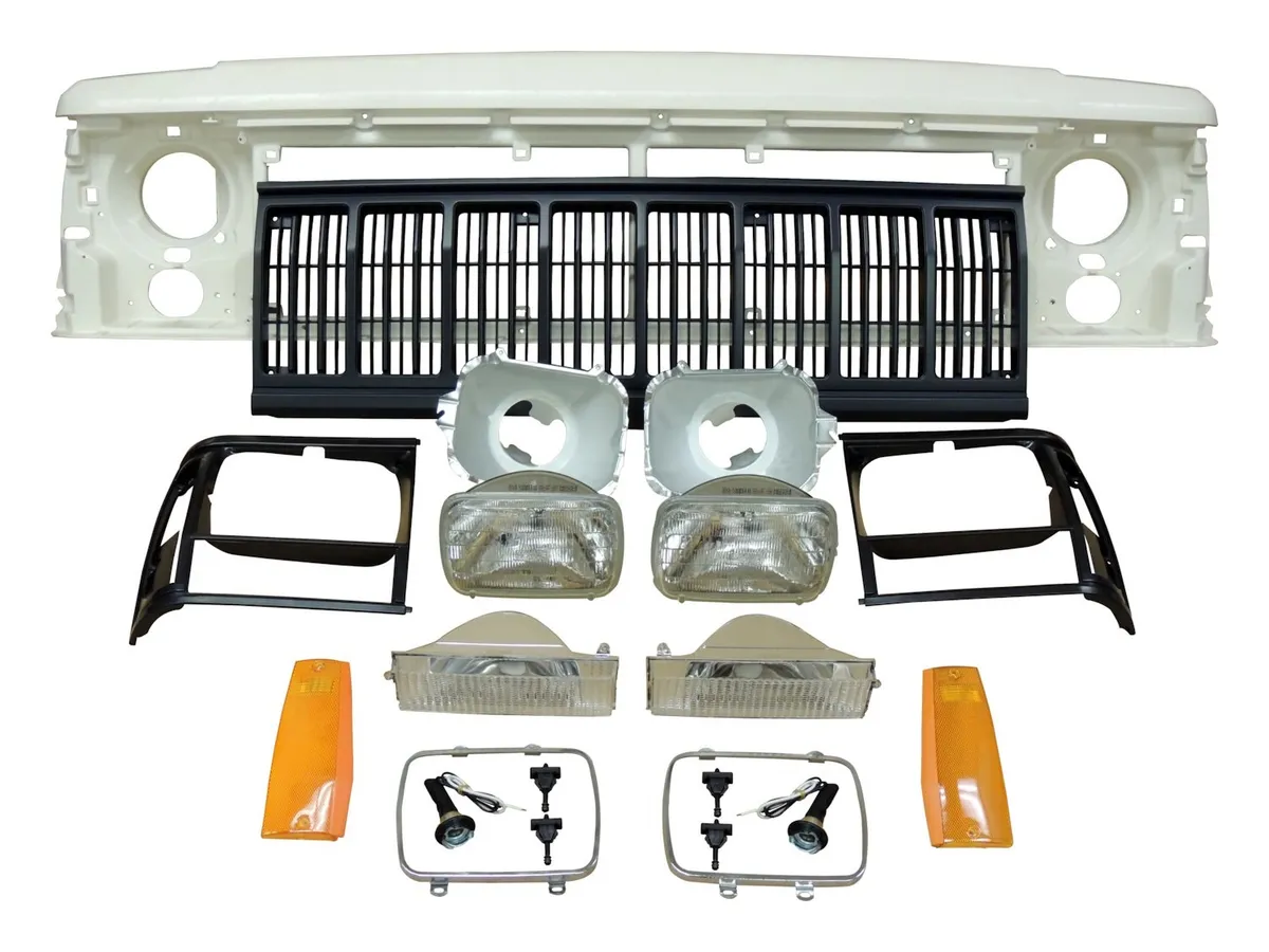 1991-1996 Cherokee XJ Black; Includes: Header Panel Headlamps Bulbs Bezels Adjusters Parking Lamps Sidemarker Lamps Grilles Headlamp Seats Headlamp Rings and all hardware product image