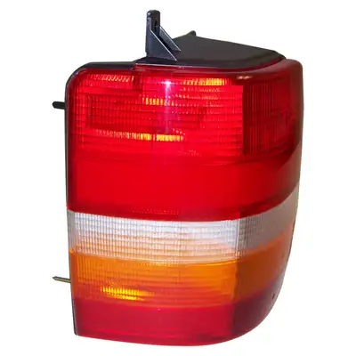 Crown Automotive Jeep Replacement Crown Automotive Jeep Replacement 55155117 Left Tail Lamp w/ 4 Large Holes for 1997-1998 Jeep ZG (Europe) Grand Cherokee