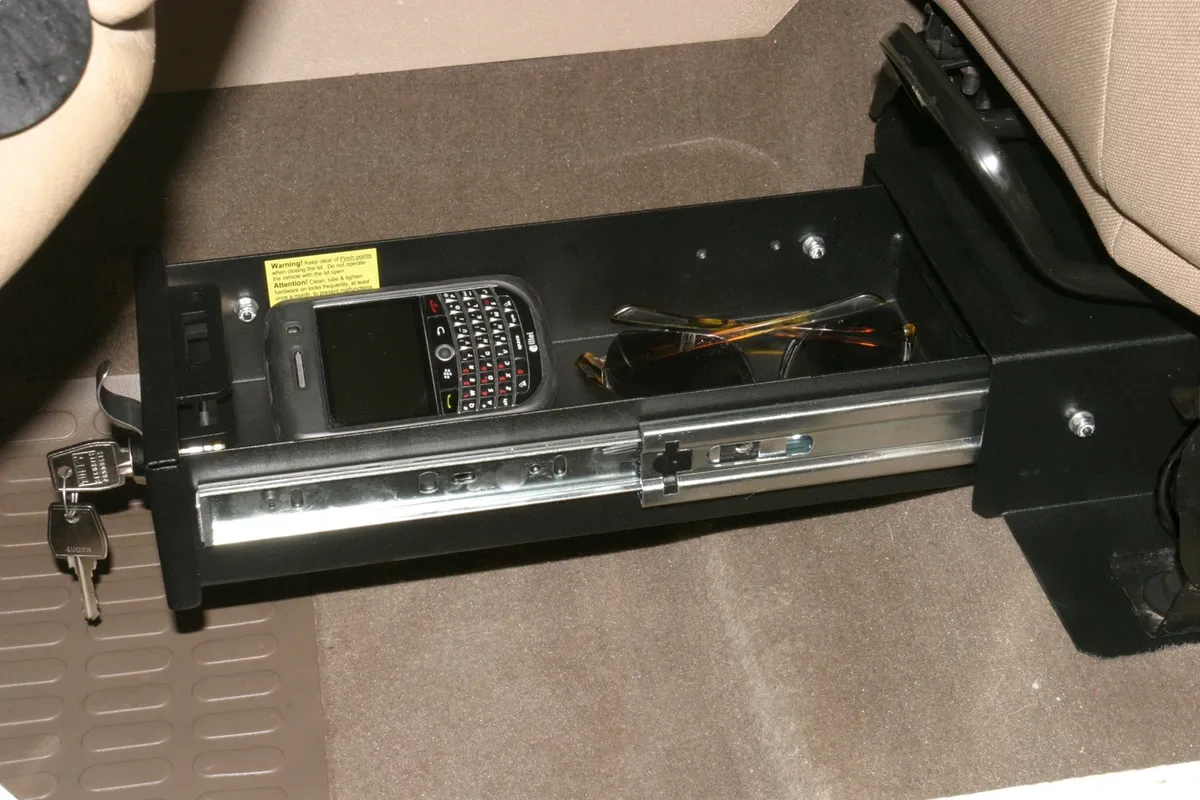 Front Driver Side Underseat Drawer - '97-02 Wrangler TJ; w/ Flip Seat (Black; Standard Key) product image