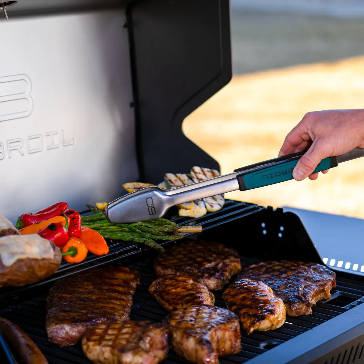 Performance Series™ FlavorMax™ 5 Burner Gas Grill Cabinet with Side Burner Blackout product image