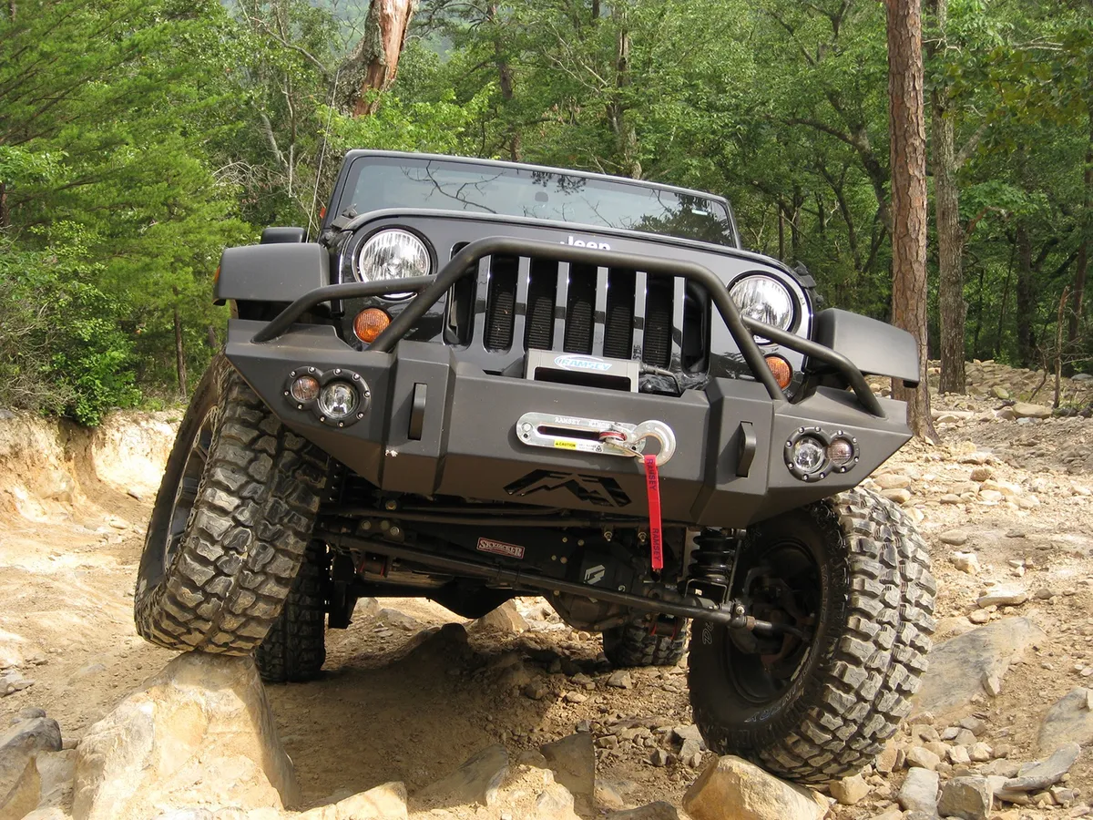 Lifestyle Winch Front Bumper; 2 Stage Black Powder Coated; w/Pre-Runner Grill Guard; Incl. Winch Mount/1 in. D-Ring Mounts/Light Cut-Outs w/Hella 90mm Fog Lamps/60mm Turn Signals; product image