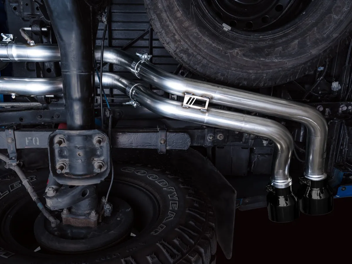 AWE 0FG Exhaust with BashGuard for 3rd Gen Tacoma - Dual Diamond Black Tips product image