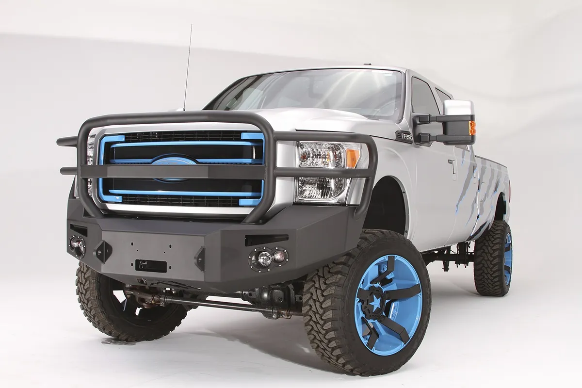 Premium Heavy Duty Winch Front Bumper; 2 Stage Black Powder Coated; w/Full Grill Guard; Incl. 1 in. D-Ring Mounts/Light Cut-Outs w/Hella 90mm Fog Lamps And 60mm Turn Signals; product image