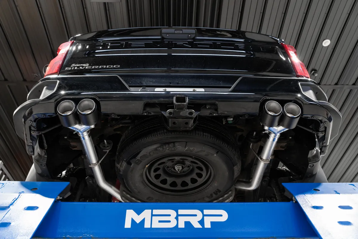 3.0 inch Cat-Back 2.5 inch Dual Split Rear Quad Carbon Fiber Tips 4.0 inch OD 19-23 Silverado/Sierra 1500 Dual Out MBRP product image
