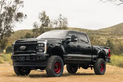 ReadyLift 6ft. Coil Spring Lift Kit with Falcon 1.1 Monotube Front/Rear Shocks; Radius Drops; and Front Track Bar Bracket