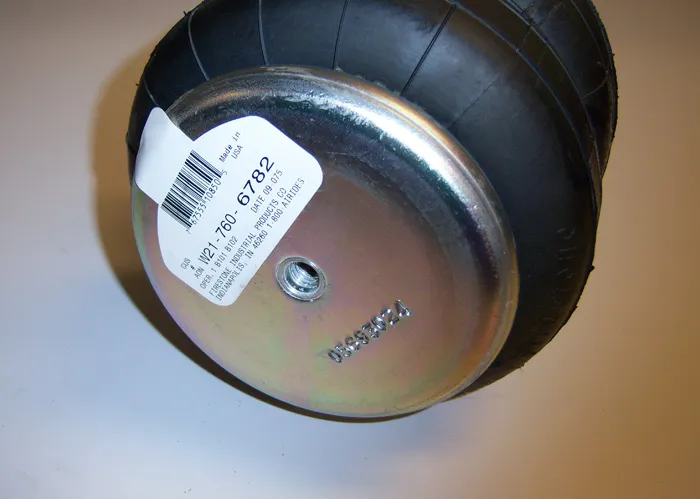 Firestone 6781 Double Convoluted Air Spring 6.5 Inch Diameter W/ 1/4 Inch NPT Port Length Is 3 Inch Minimum 4.5 -5 Inch Ride Height And 7 Inch Maximum Load Capacity Is 2140 LbsAt 100 Psi Ridetech product image