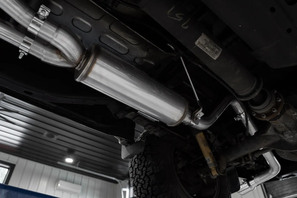 Armor Lite Cat Back Performance Exhaust System; 2.5 in. Diameter; 3 in. Single High Clearance Rear Exit; Turn Down Tail; Aluminized Steel; product image