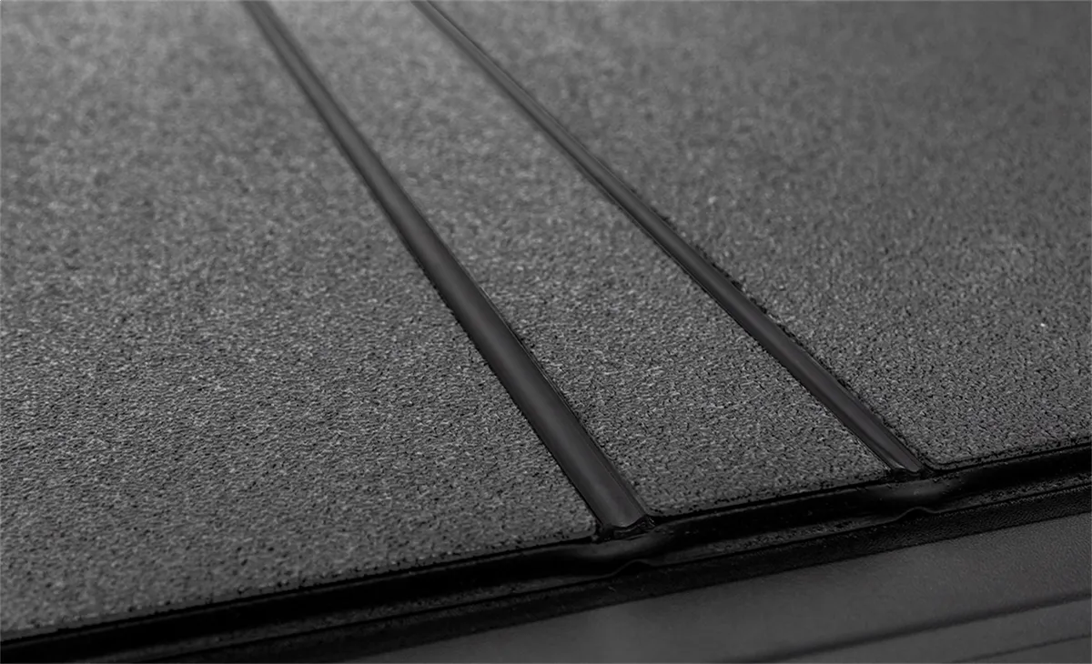 24c Tacoma 5ft Lomax Folding Hard Tonneau Cover Carbon Fiber Single Rail product image