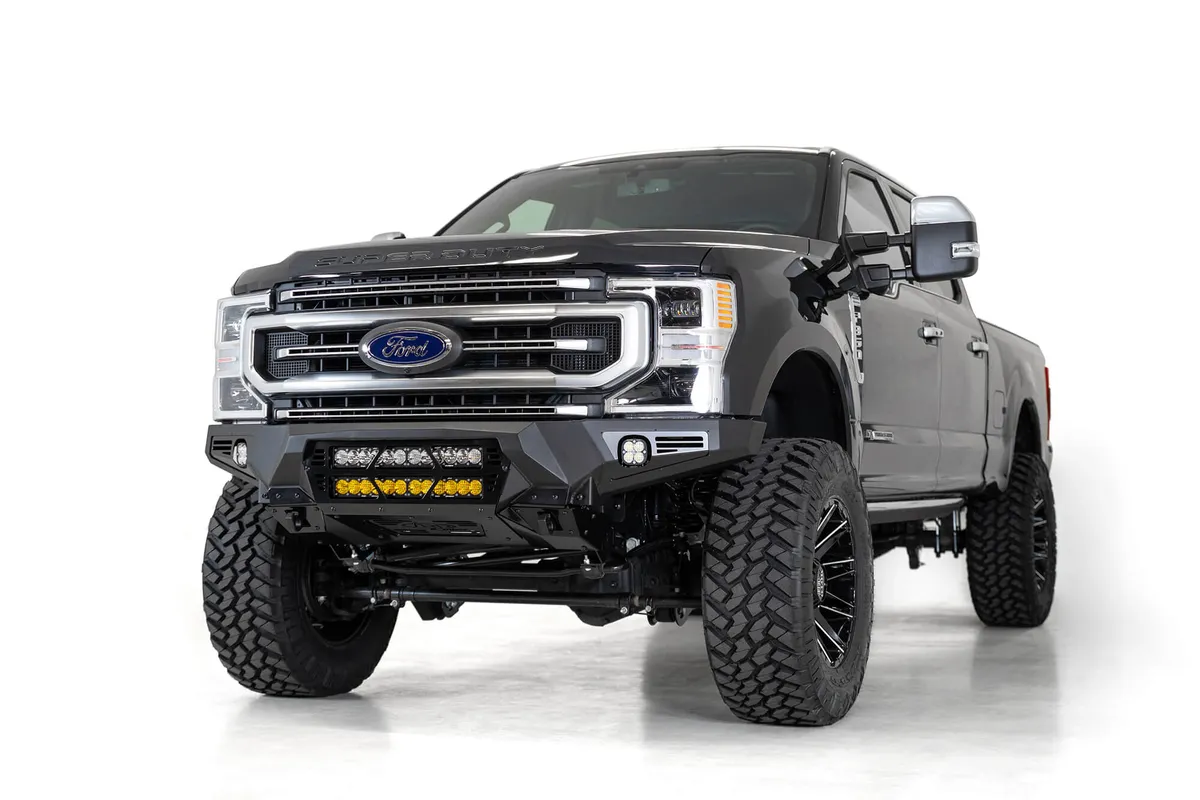 The Addictive Desert Designs Bomber front bumper brings the ultimate combination of form and function to the Ford F250F350. A full 316 aluminum skid plate offers superior protection while keeping the bumper lightweight. Three different light options ar product image