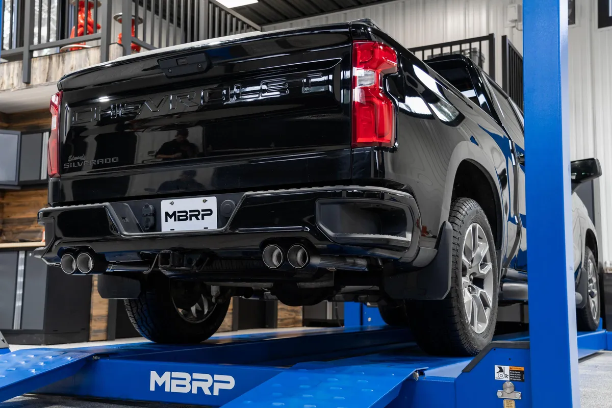 3.0 inch Cat-Back 2.5 inch Dual Split Rear Quad Carbon Fiber Tips 4.0 inch OD 19-23 Silverado/Sierra 1500 Dual Out MBRP product image