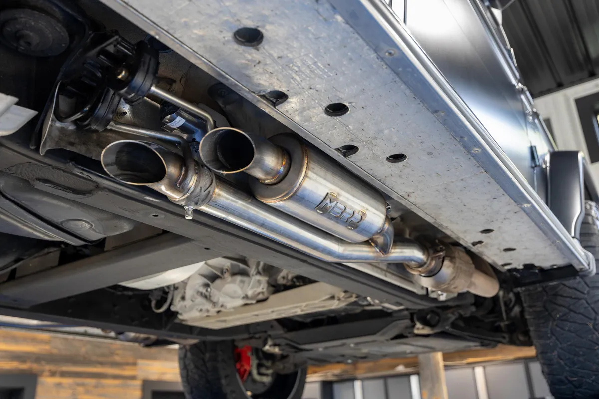 Armor Pro Axle Back Exhaust System; 2.5 in Diameter; Dual Split Side; T304 Stainless Steel; w/2.5 in. Quad Outlet Turn Down Tail; product image