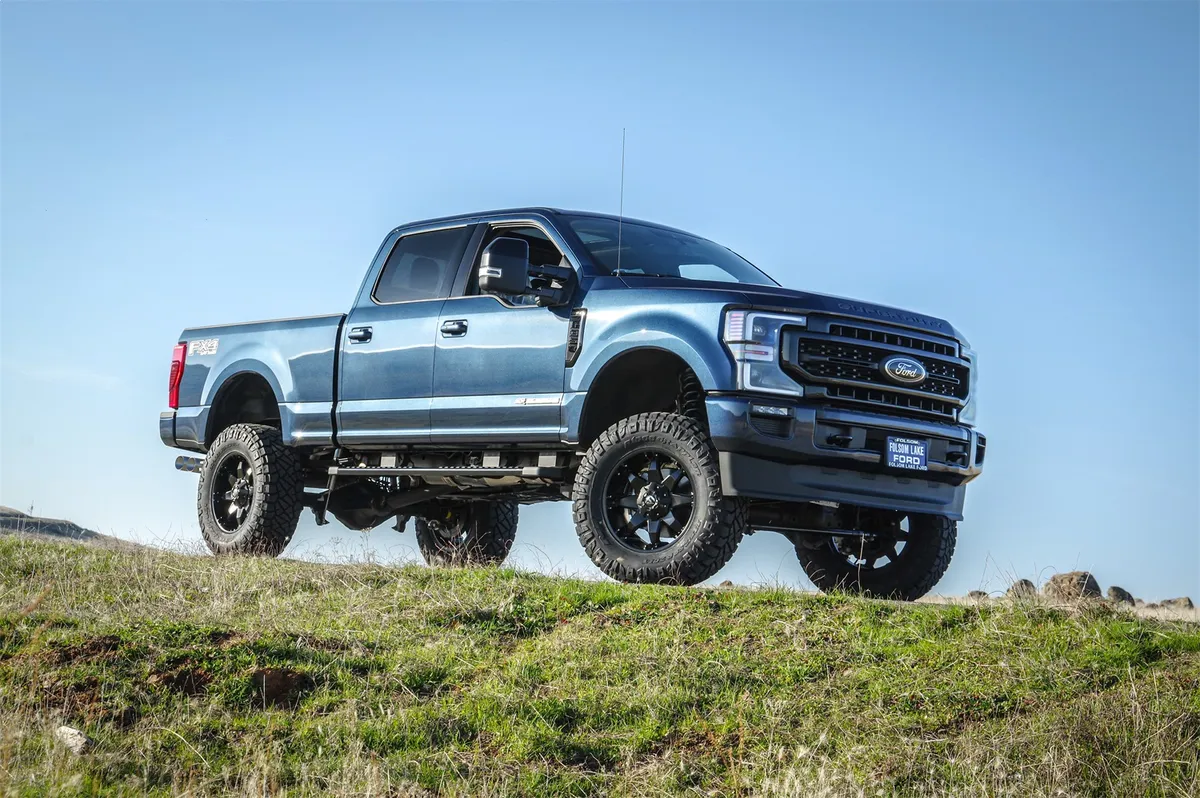 2017-2022 Ford F250 Diesel 4WD 7 Coil Spring Lift Kit with Falcon 1.1 Monotube FrontRear Shocks and Front Track Bar Bracket Trucks without Camper Spring Package product image