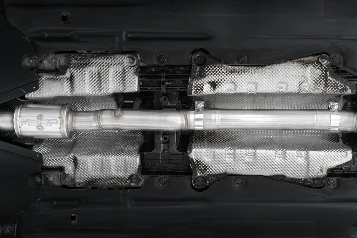 Armor Pro Cat Back Exhaust System; 3.0 in.; Triple Center Outlet; T304 Stainless Steel; 2 Outlets 4 in. Outer Diameter; 1 Outlet 5 in. Outer Diameter; w/Carbon Fiber Tips; product image