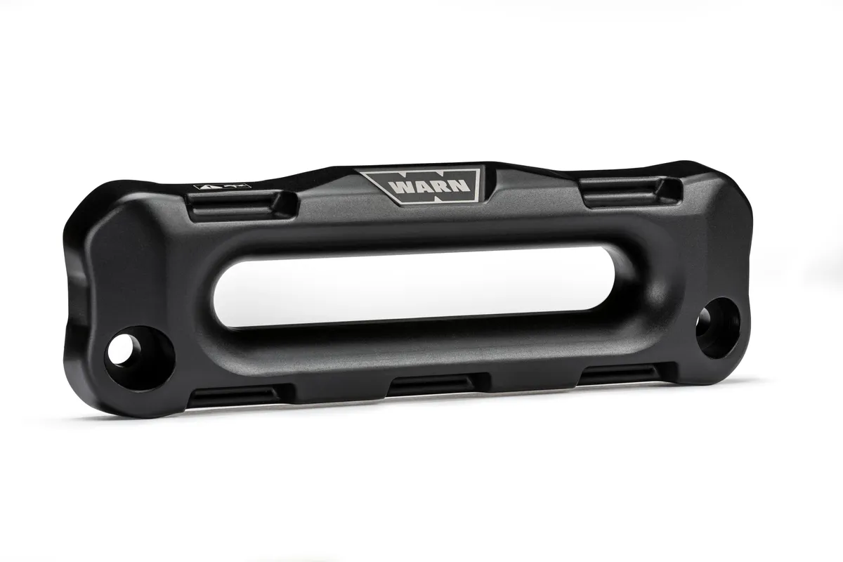 WARN - Offset forged aluminum hawse fairlead for bumpers that require winch to mount foot forward such as ARB. 1.5 in. thickness with a black hard-anodized f product image