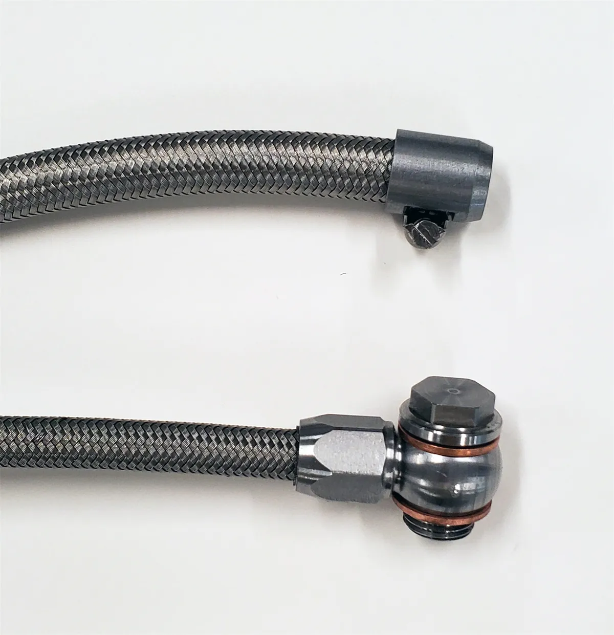 Borgeson stainless steel power steering hose kit; 2 pc. with banjo fittings. Fittings are crimped on one end. Connects GM pump to Borgeson conversion boxes part numbers 800110; 800111; 800114; 800115; 800117; 800126; 800127; 800131; 999062. product image