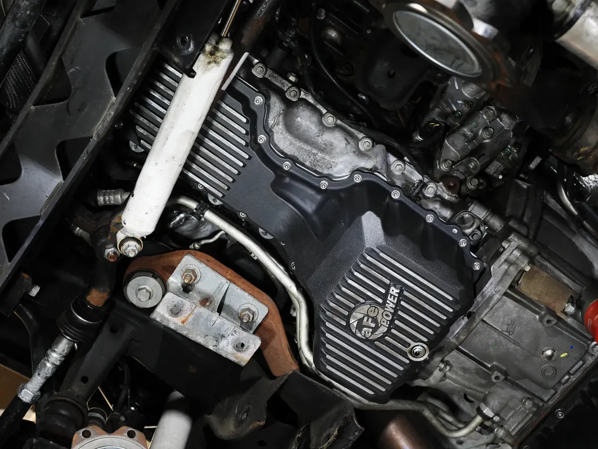 AFE Power Pro Series Engine Oil Pan Black w/ Machined Fins GM Diesel Trucks 17-19 V8-6.6L (td) L5P 46-71360B 46-71360B product image