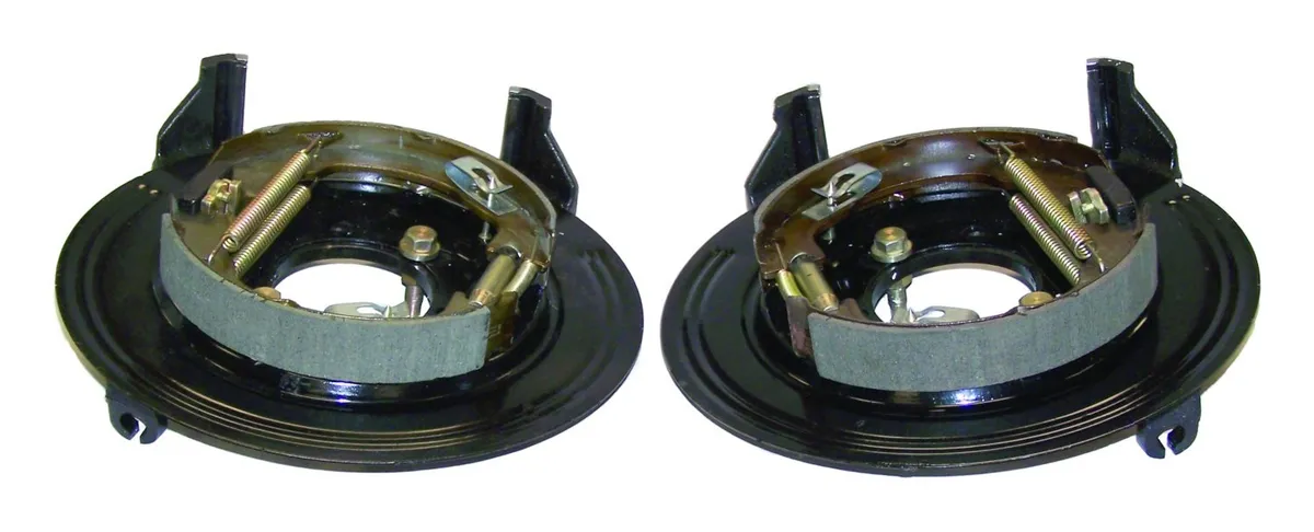 Backing Plate Set; Rear; Incl. Backing Plates/Caliper Brackets/Parking Brake Shoes/Springs/Hardware; For Use w/Dana 35; product image