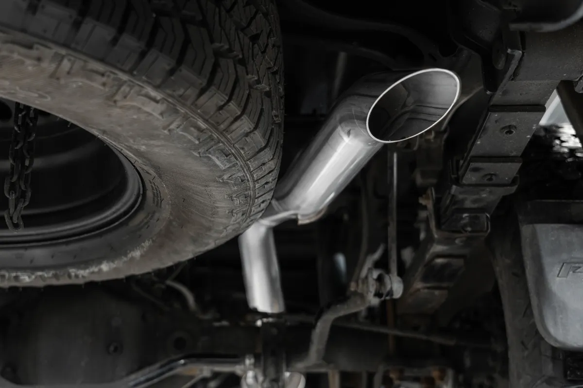 Armor Lite Cat Back Performance Exhaust System; 2.5 in. Diameter; 3 in. Single High Clearance Rear Exit; Turn Down Tail; Aluminized Steel; product image