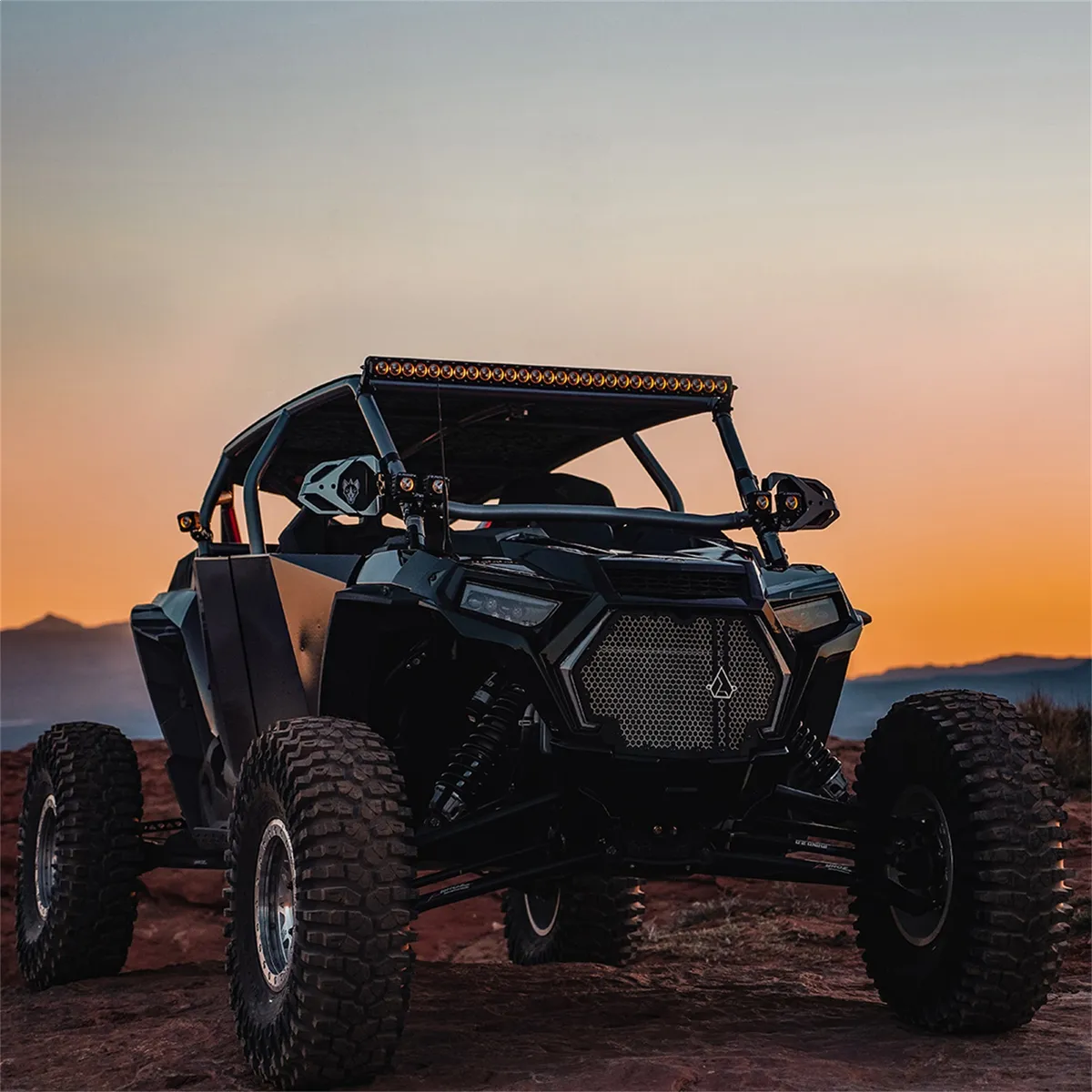 The Revolve Light Bar is built with a high-grade aluminum alloy; an impact resistant nylon bezel; and is coated with a durable textured powder-coat finish. It features Broad-Spot optics and back-lit trim rings available in amber or white. product image