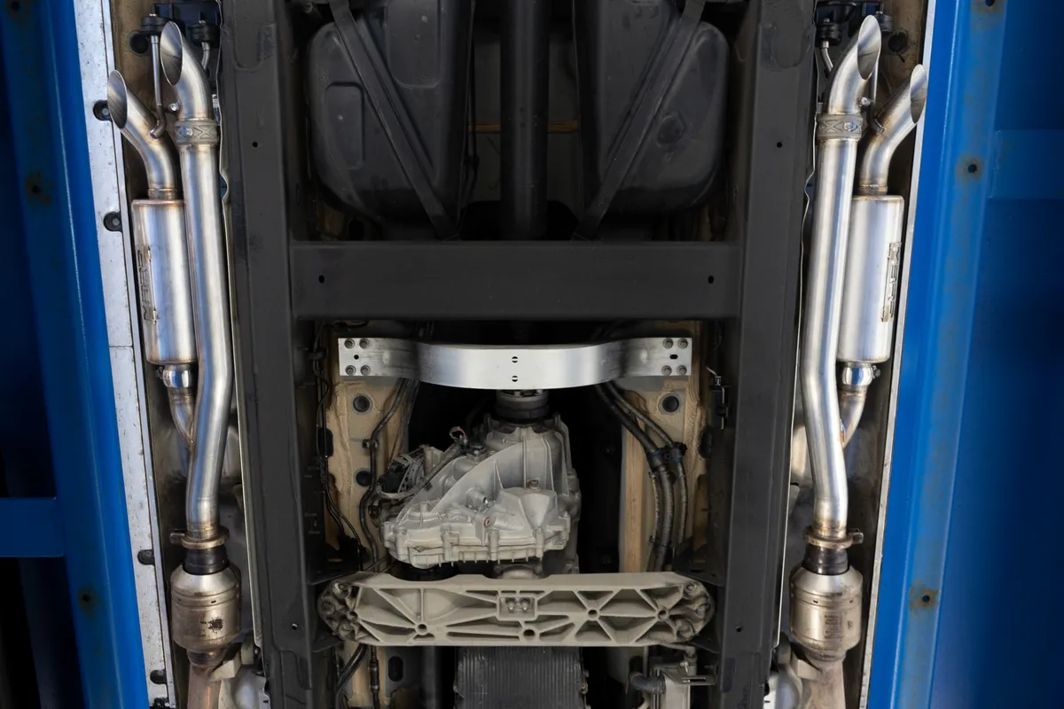 Armor Pro Axle Back Exhaust System; 2.5 in Diameter; Dual Split Side; T304 Stainless Steel; w/2.5 in. Quad Outlet Turn Down Tail; product image