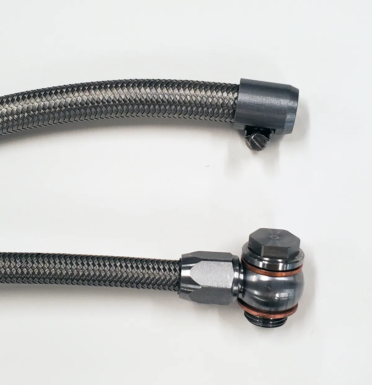 Borgeson stainless steel power steering hose kit; 2 pc. with banjo fittings. Fittings are crimped on one end. Connects GM pump to Borgeson conversion boxes part numbers 800110; 800111; 800114; 800115; 800117; 800126; 800127; 800131; 999062. product image