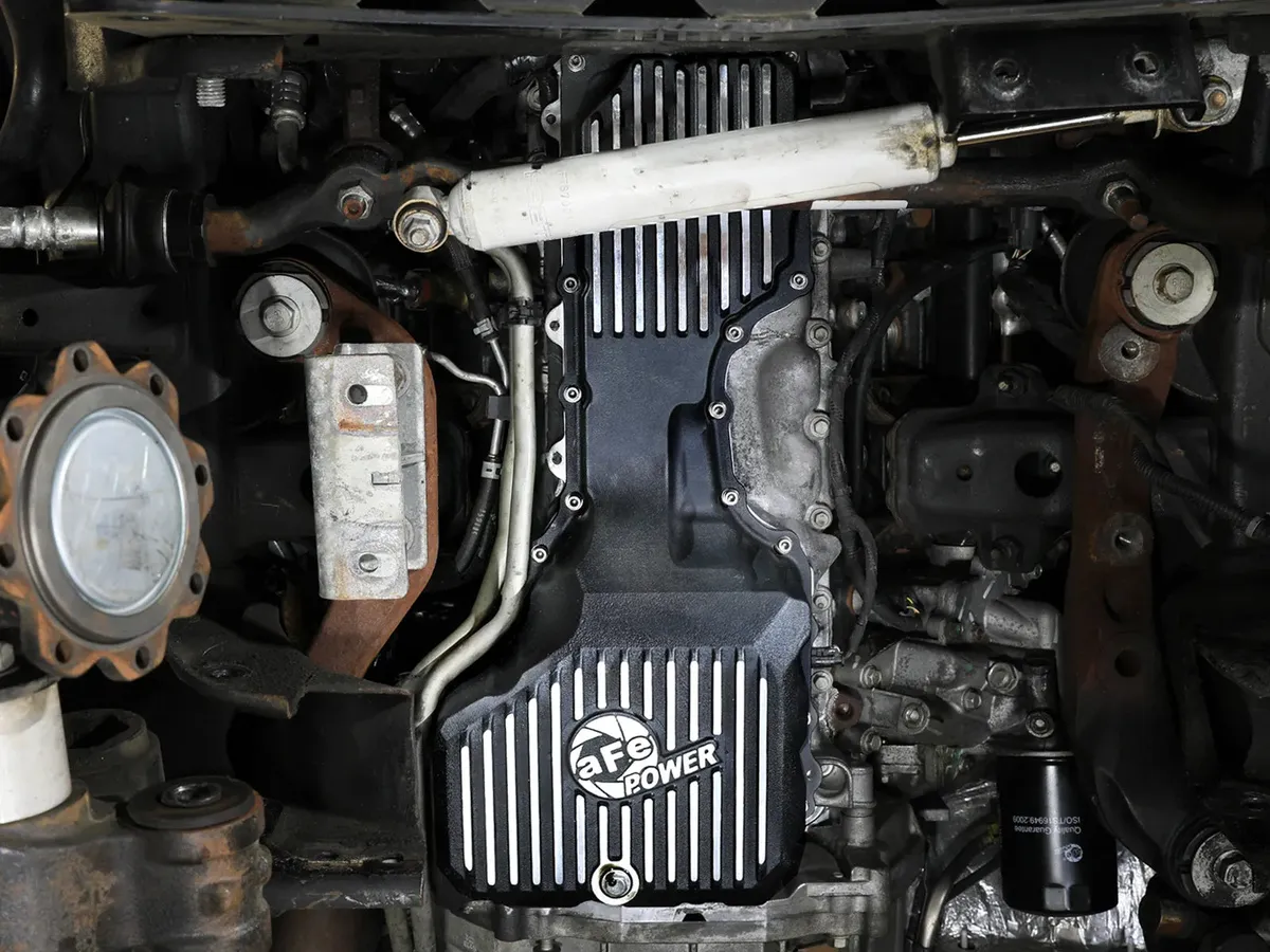 AFE Power Pro Series Engine Oil Pan Black w/ Machined Fins GM Diesel Trucks 17-19 V8-6.6L (td) L5P 46-71360B 46-71360B product image