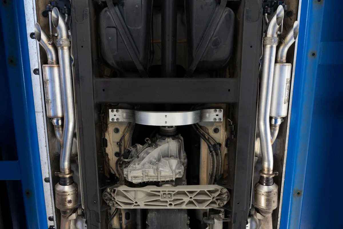 Armor Pro Axle Back Exhaust System; 2.5 in Diameter; Dual Split Side; T304 Stainless Steel; w/2.5 in. Quad Outlet Turn Down Tail; product image