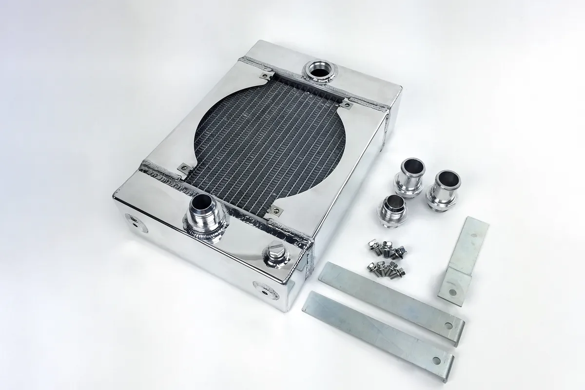 Universal Drag Race / Tuck Radiator -10.5H" x 10L" x 3.6W" (5.65" w/fan) - Includes 9-inch SPAL fan - Includes inlet/outlet kit (1.25 or -16) + installation brackets product image