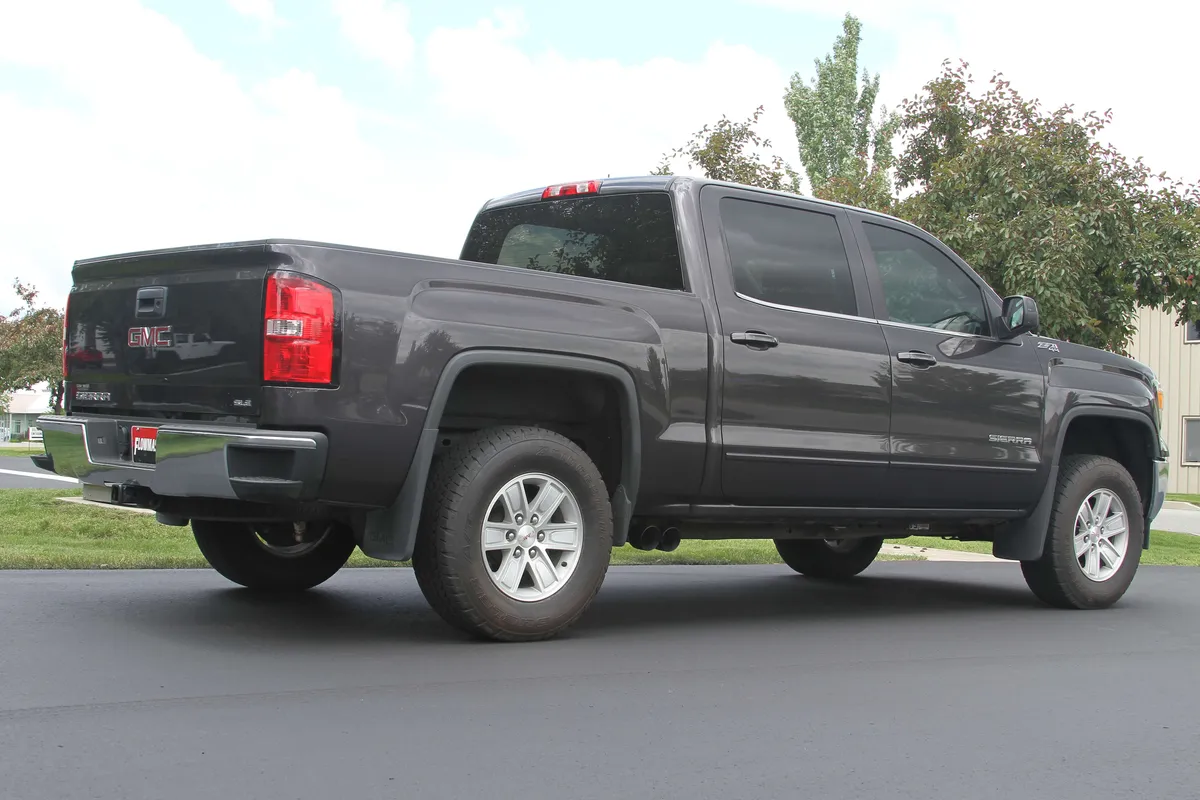 2014-2018 GM SilveradoSierra 1500 12 Ton 5.3L V8 Crew Cab and Double Cab 24 Wheel Drive Except Crew Cab 2WD with 2 Pc Driveshaft Cat-back Flow FX Series Muffler Mandrel Bent 2.5in. 16 Gauge Tubing 4 in. Black Ceramic Coated Tips WEtched product image