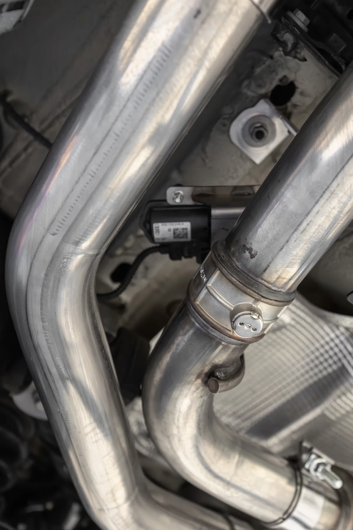 Armor Pro Cat Back Exhaust System; 3 in.; Quad Split Rear Exit; 4.5 in. Carbon Fiber Tips; w/Active Exhaust; T304 Stainless Steel; product image