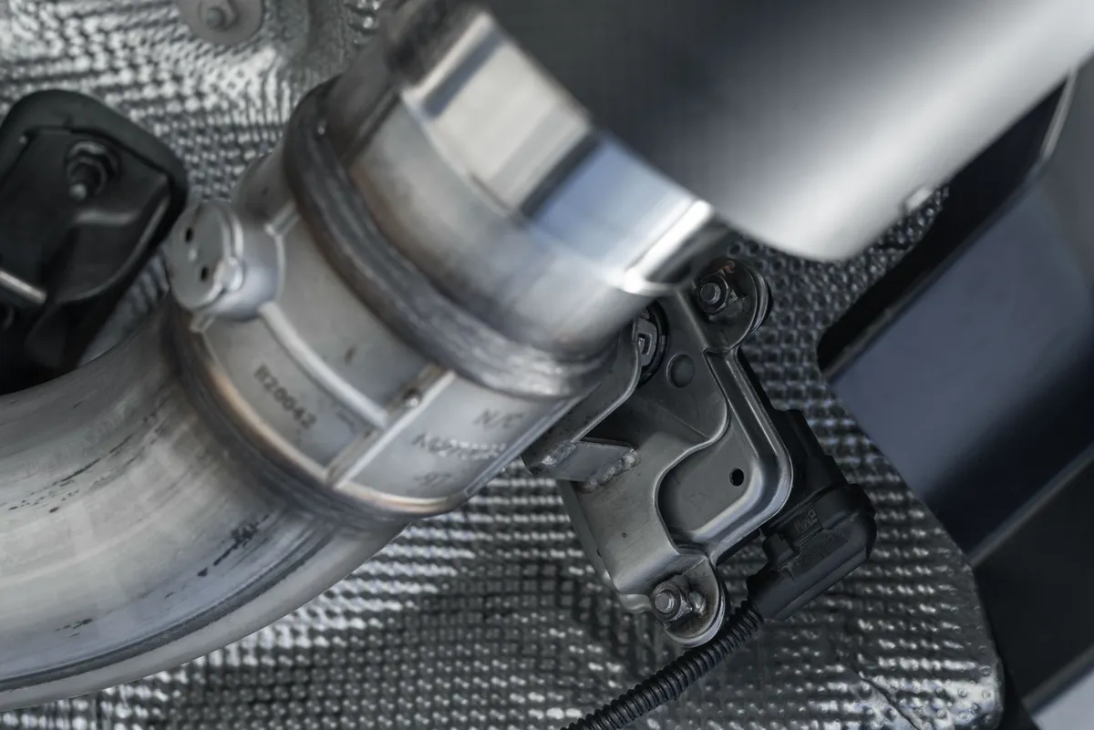 Armor Pro Cat Back Exhaust System; 3 in.; T304 Stainless Steel; Dual Rear Exit; 4.5 in. Carbon Fiber Tips; product image