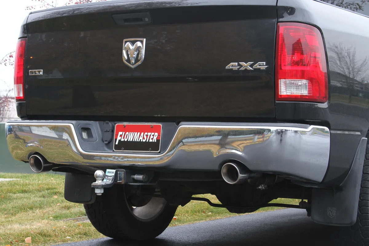 09-13 Dodge Ram 1500 5.7L Hemi Magnum 2/4 Wheel Drive All Wheelbases 2.50in Outlets 50 Series H.D. Muffler 4.00in Logo Embossed Stainless Tips American Thunder; Incl Tube Extensions For Dual Rear Exit In Kit Mandrel Bent Tubing 16 Gauge 409S Stai product image