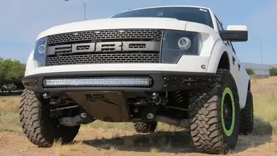 Addictive Desert Designs 2010-2014 Raptor Venom R Front Bumper with 10 Dually mountsuniversal plate on top and 6 SR Mounts in Sides in Hammer Black with Satin Black Panels