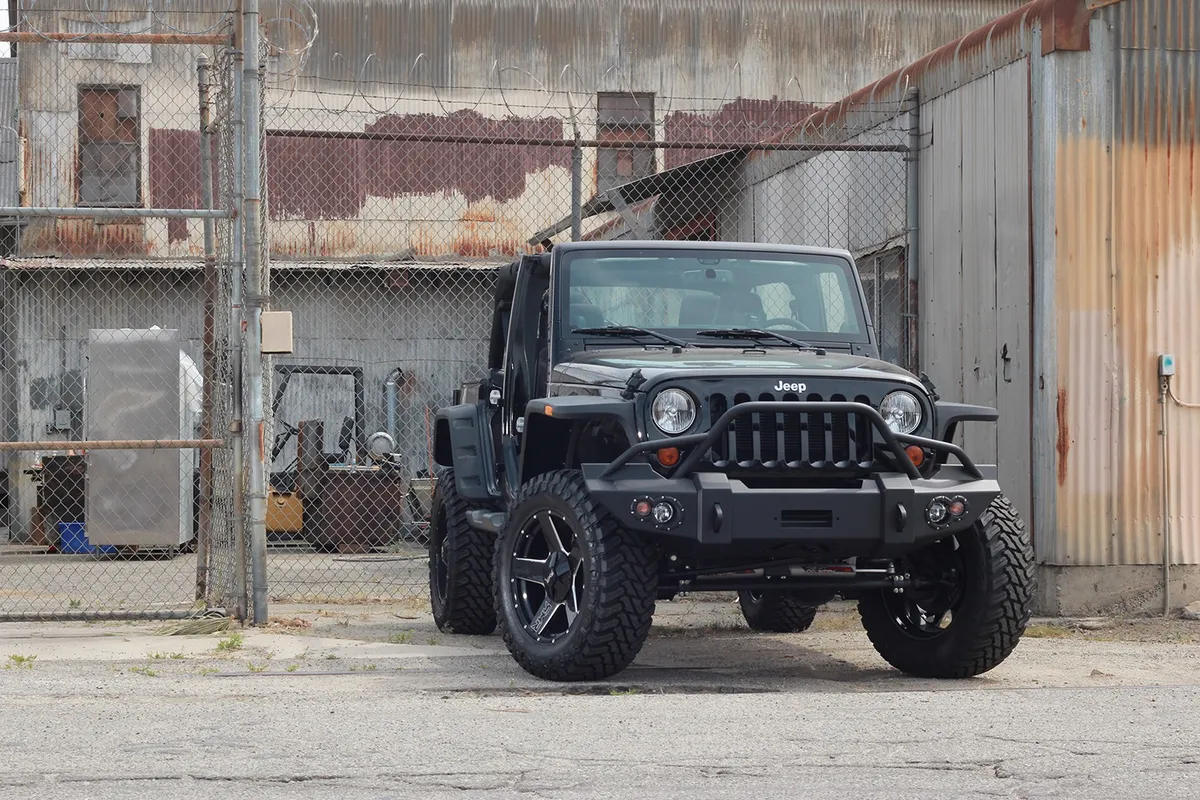 Lifestyle Winch Front Bumper; 2 Stage Black Powder Coated; w/Pre-Runner Grill Guard; Incl. Winch Mount/1 in. D-Ring Mounts/Light Cut-Outs w/Hella 90mm Fog Lamps/60mm Turn Signals; product image